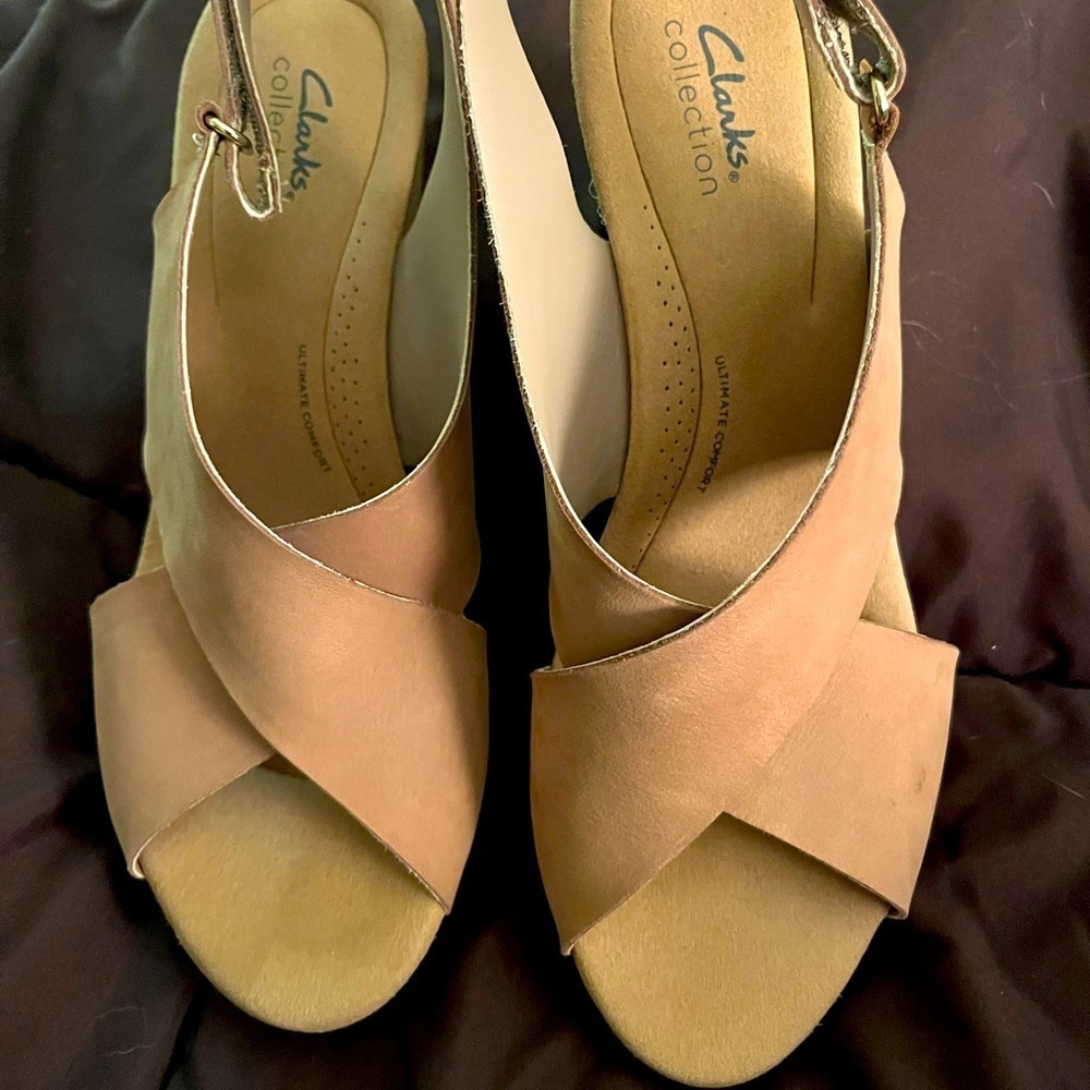 Clark’s wedge sandals.  Only tried on.  Women’s size 12